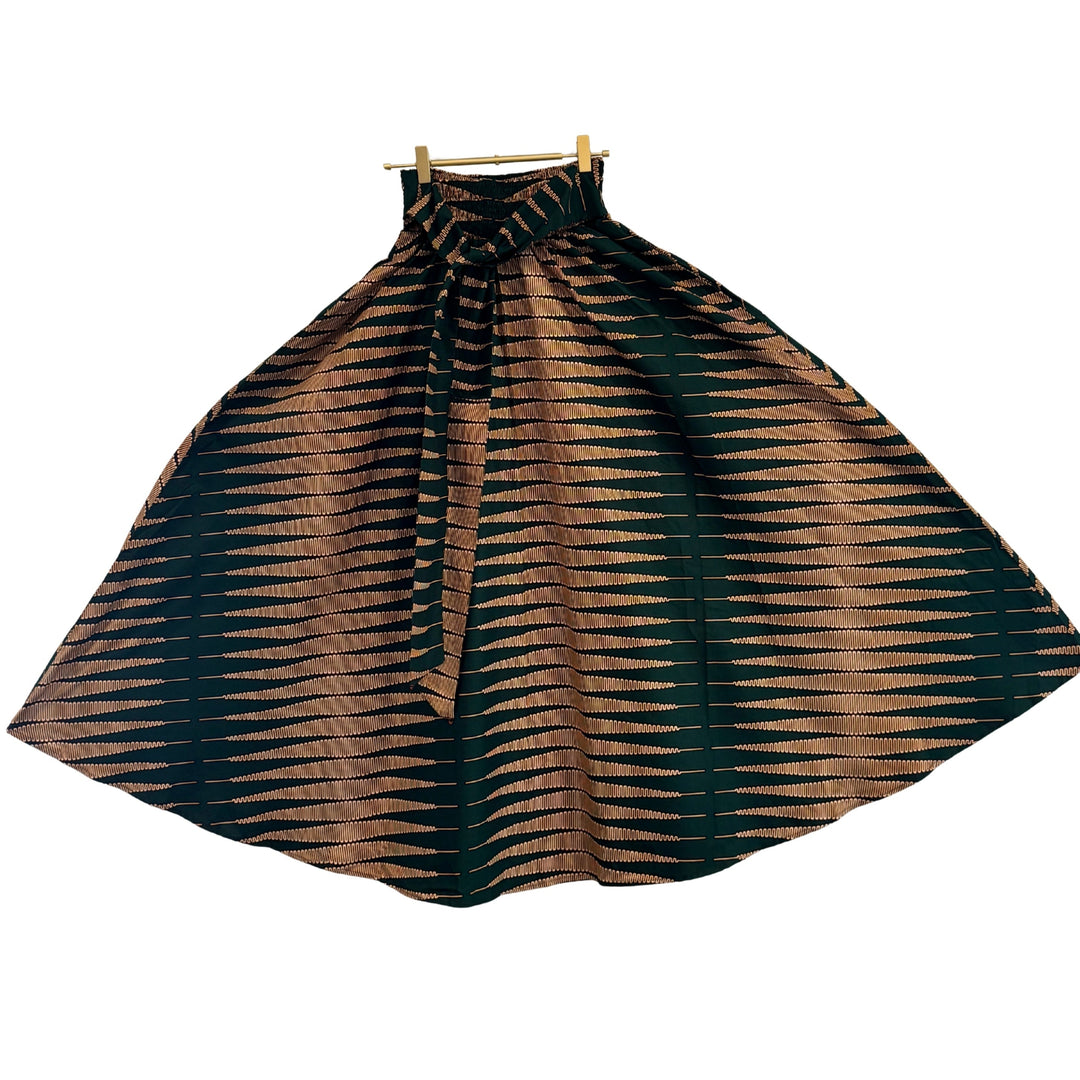 Black and brown patterned dress on a white background