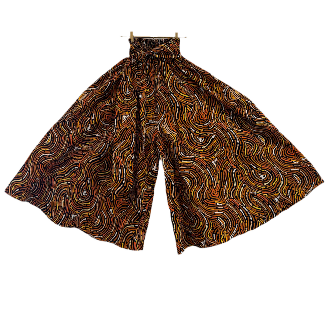 Brown patterned pants on a white background